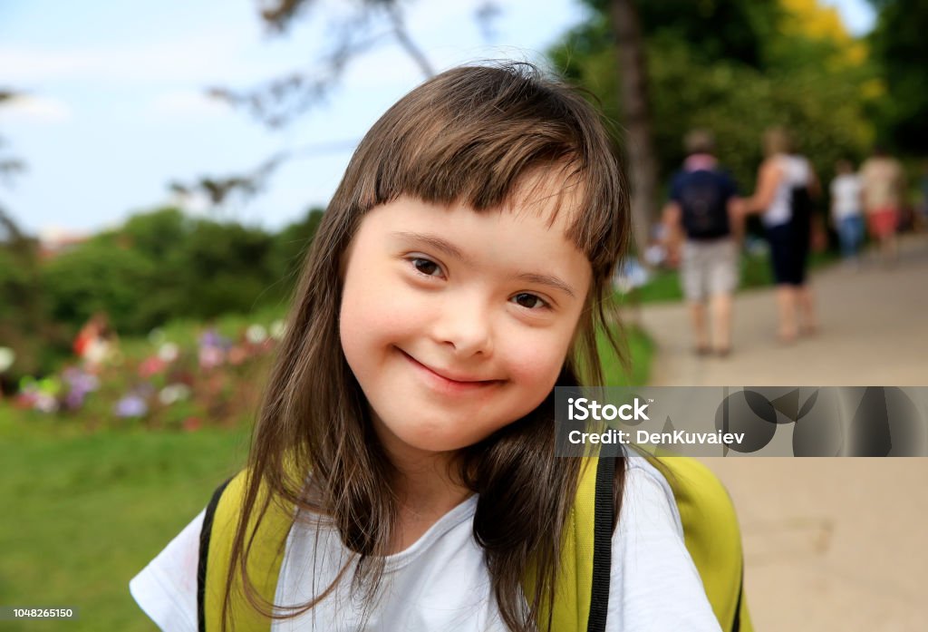 Portrait of little girl smiling in the park